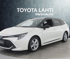 TOURING SPORTS 1,8 HYBRID STYLE