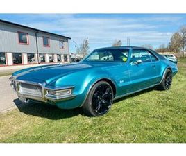 OLDSMOBILE TORONADO OLDSMOBILE TORONADO COUPÉ 7.5 V8 AUT 381 HKR 20 TUM ALU 1968 RUGGIG BIL!