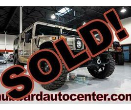 HUMMER H1 USED 2002 HUMMER H1 4-PASSENGER WAGON ENCLOSED
