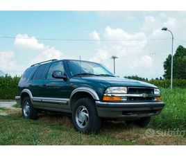 PELLICCIA IN ASTRAKAN E COLLO IN PELLICCIA