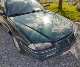 PONTIAC GRAND AM ② PONTIAC GRAND AM 1995 — PONTIAC — 2EMEMAIN