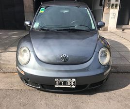 VOLKSWAGEN NEW BEETLE FULL. LEVANTA CRISTALES. AIRE ACONDICIONADO. FUNCIONA TODO