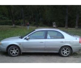 KIA SHUMA II ≫ 2004 • 1 500 ЛВ. • ID