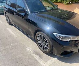 330E XDRIVE TOURING