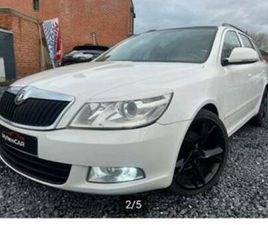 SKODA OCTAVIA COMBI ② SKODA OCTAVIA 1,6 TDI BOÎTE AUTOMATIQUE — SKODA — 2EMEMAIN