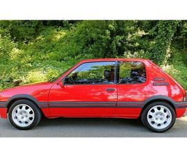 PEUGEOT 205 1990 PEUGEOT 205 ROUGE MANUEL, 7+ VITESSES CONDUITE À GAU...