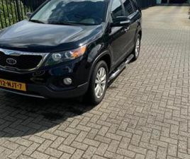 KIA SORENTO KIA SORENTO 2.4 4WD AUT 7P 2010 ZWART — KIA — MARKTPLAATS