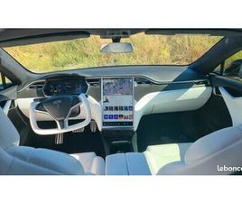 TESLA MODEL S PERFORMANCE LUDICROUS TESLA MODEL S P100D – LUDICROUS+ 2,4S – STYLE PLAID / FULL BLACK CARBONE / INTÉRIEUR BLANC