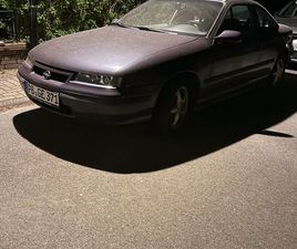 OPEL CALIBRA OPEL CALIBRA V6 BJ 96 – „NORDIK VIOLETT METALLIC“, MIT ZUBEHÖR