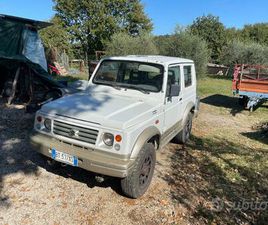 SUZUKI SAMURAI CON RIMORCHIO PER TRASPORTO CANI