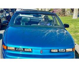 1993 OLDSMOBILE CUTLASS BLEU AUTOMATIQUE, 4 VITESSES COND...