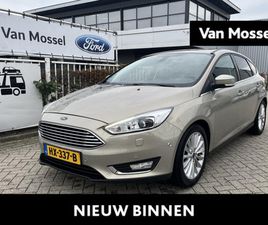 FORD FOCUS 1.0 TITANIUM EDITION | STOEL / VOORRUIT VERWARMING | PARKEERSENSOREN VOOR EN ACHTER | CUISE CONTROL | NAVI | LMV 17'' | 4 SEIZOENEN BANDEN |