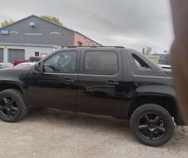 CHEVROLET AVALANCHE BLACK ON BLACK LIFTED AVALANCHE