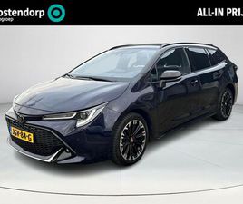TOYOTA COROLLA TOURING SPORTS TOYOTA COROLLA TOURING SPORTS - 1.8 HYBRID GR-SPORT *NAVIGATIE/ HEAD-UP DISLPAY/ STOEL EN STUURWIELVERWARMING/ 36 MAANDEN