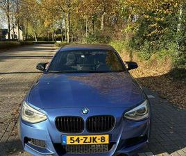 BMW SERIE 1 114 BMW 114I – WOLF IN SCHAAPSKLEREN (225 PK)