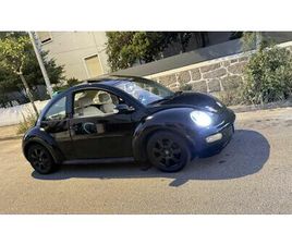 VOLKSWAGEN NEW BEETLE