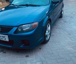 MAZDA PROTEGE AN. 2002