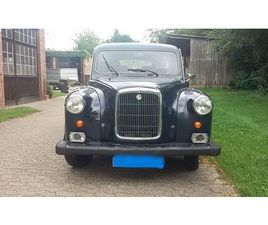 AUSTIN FX4 ZWEI LONDON TAXIS FX4S (LINKSLENKER MIT AHK + RECHTSLENKER) LTI