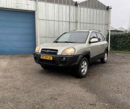 HYUNDAI TUCSON ORG NL HYUNDAI TUCSON 2.7 V6 4WD AUT 2006 GRIJS INCL NAP — HYUNDAI — MARKTPLAATS