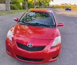 TOYOTA YARIS 2009 TOYOTA YARIS, AUTOMATIC, 4DR. RED, EXTRA SET OF TIRES $2999
