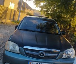MAZDA TRIBUTE AN. 2004