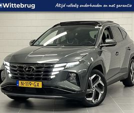 HYUNDAI TUCSON HYUNDAI TUCSON 1.6 T-GDI HEV PREMIUM SKY TREKHAAK 1650 KG TREKGEWICHT! | PANORAMADAK | LEDER | BOMVOL OPTIES!