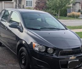 2015 CHEVROLET SONIC HATCHBACK – RELIABLE, GREAT ON GAS, AS-IS