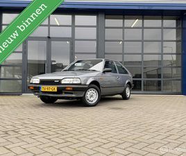 MAZDA 323 MAZDA 323 - 1.3 LX H4 ORG. NL NETTE STAAT