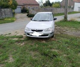 ② MAZDA 323 — MAZDA — 2EMEMAIN