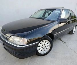 OMEGA GLS - PLACA PRETA - COM TELEFONE