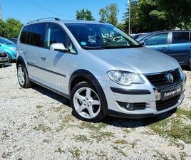 VOLKSWAGEN TOURAN 2.0 PD TDI HIGHLINE CROSS .7 SZEMÉLYES. BÖR. V-HOROG.NAVI