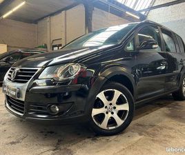 VOLKSWAGEN CROSSTOURAN VOLKSWAGEN CROSS TOURAN 2.0 TDI 140 CV BOITE AUTOMATIQUE DSG / SERIE LIMITÉE / 7 PLACES / TOIT OUVRANT / RÉGULATEUR / CARPLAY / RADAR / FRANÇAIS / DISTRIBUTION