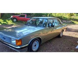 OPALA 4 PORTAS, PLACA PRETA...