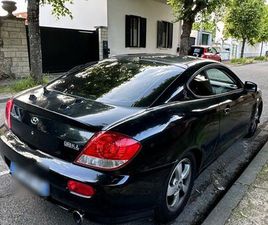 HYUNDAI COUPÉ NOIRE : 1,6 105CH ESSENCE (PRIX LÉGÈREMENT NÉGOCIABLE)