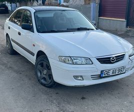 MAZDA 626 AN. 2002