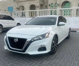 NISSAN ALTIMA SR ( 2022 MODEL ) IN WHITE COLOR GCC SPECS THIS HAS DONE A KILOMETER OF 30,000 KM