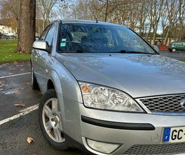 AFFAIRE EN OR : FORD MONDEO 2 GHIA 1L8 125CH