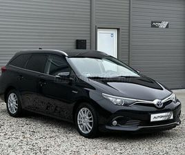 TOYOTA AURIS TOURING SPORTS 1.8 HSD SELECTION (AUTOMATA) NAVI-TOLATÓKAMERA-ÜLÉSFŰTÉS-SZERVIZKÖNYV