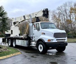 STERLING L LINE USED 2004 STERLING LT9500 NATIONAL CRANE 600D FLAT DECK CRANE TRUCK