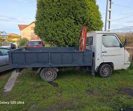 NISSAN - TRADE 2.3 DIESEL CON GRUA