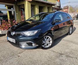 TOYOTA AURIS TOURING SPORTS 1.8 HSD EXECUTIVE SKYVIEW (AUTOMATA) TOYOTÁBAN SZERVIZELT HYBRID GARANCIA