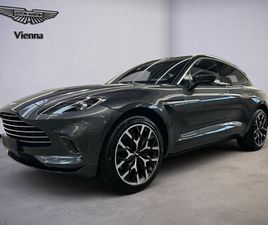 ASTON MARTIN DBX / XENON GREY / OBSIDIAN BLACK & SPICY RED