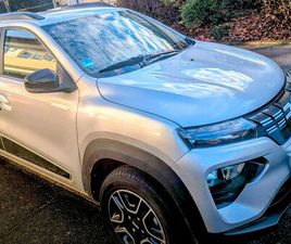 DACIA BIGSTER DACIA SPRING COMFORT PLUS MIT GARANTIE BIS 6. 2027 ZUSTAND TOP .