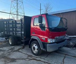 2006 FORD LCF STAKE BODY TRUCK