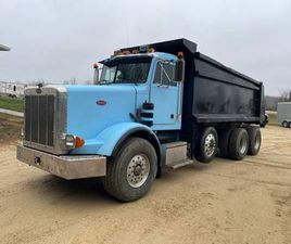 PETERBILT 357 1993 PETERBILT 357 DUMP TRUCK—55,312 MI, 3176 CAT ENGINE—BID NOW!