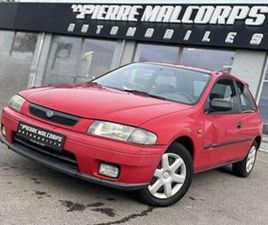 MAZDA 323 ② MAZDA 323 1.5I 16V TSI / MARCHAND OU EXPORT / AIRCO / RADIO — MAZDA — 2EMEMAIN