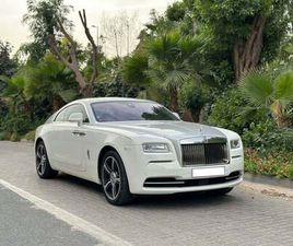 ROLLS-ROYCE WRAITH 2015 ROLLS ROYCE WRAITH | GCC SPECS | 6.6L V12 | 624 HP | 66K KM | WHITE/RED | STARLIGHT HEADLINER |