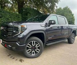 GMC SIERRA 1500 ② GMC SIERRA 1500 AT4 6.2 V8 €69.900 ,- EXCL BTW — GMC — 2EMEMAIN