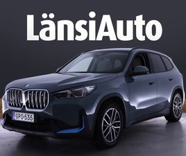 BMW IX1 U11 30 XDRIVE FULLY CHARGED - SIISTIKUNTOINEN BMW IX1 HYVILLÄ VARUSTEILLA! COMFORT-, FULLY CHARGED-, INNOVATION-, JA M SPORT PAKETEILLA! VETOKOUKULLA JA