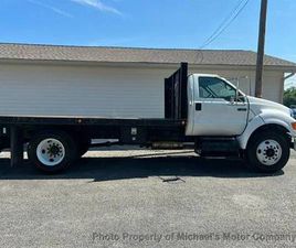 FORD F 650 1 OWNER - 4K TOMMY GATE - 17FT X 8FT FLAT BED TRUCK
